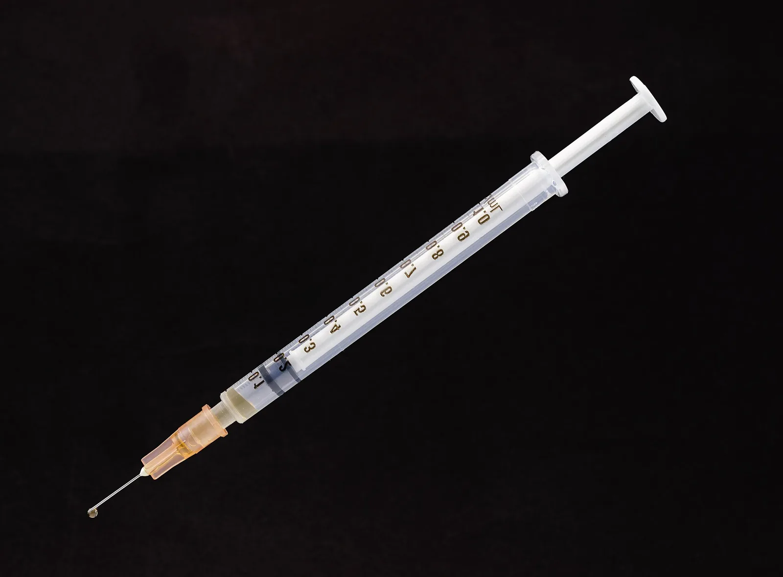 A 1 ml disposable syringe with needle, made for single use
