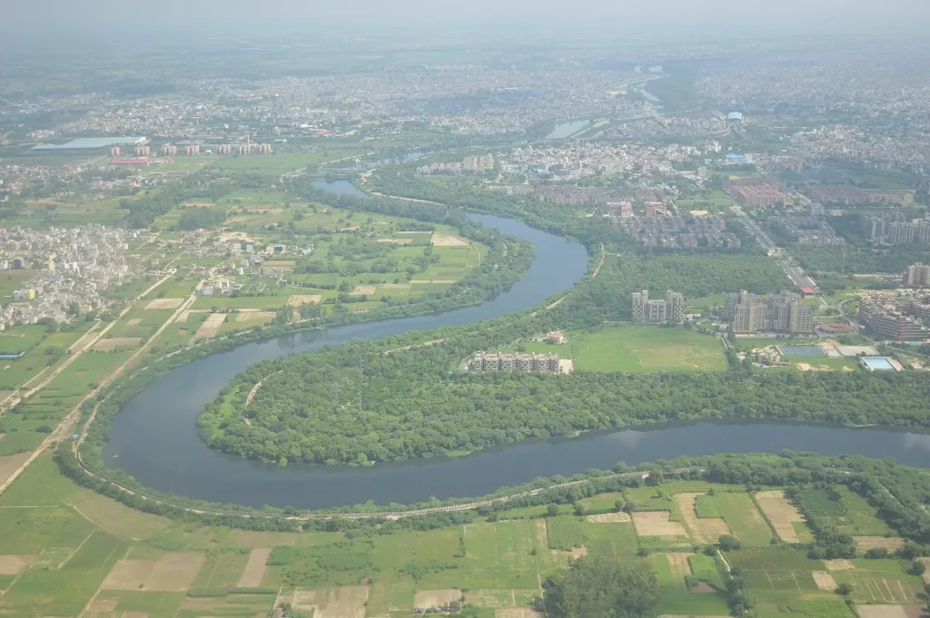 Aerial view of fields and Delhi villages beside the Najafgarh drain in west Delhi