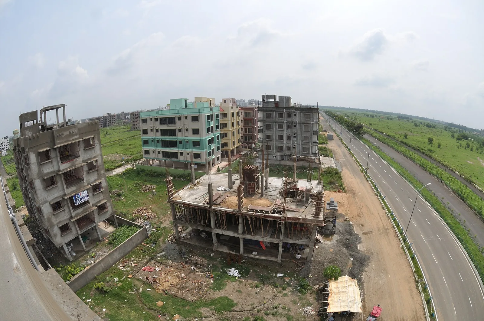 Apartment blocks under construction in Kolkata, where home loan EMI costs matter to buyers