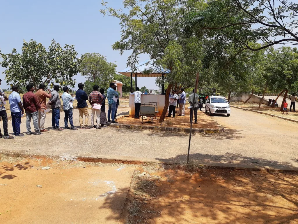 Applicants queue at an RTO driving test track in Tamil Nadu as driving licence rules change