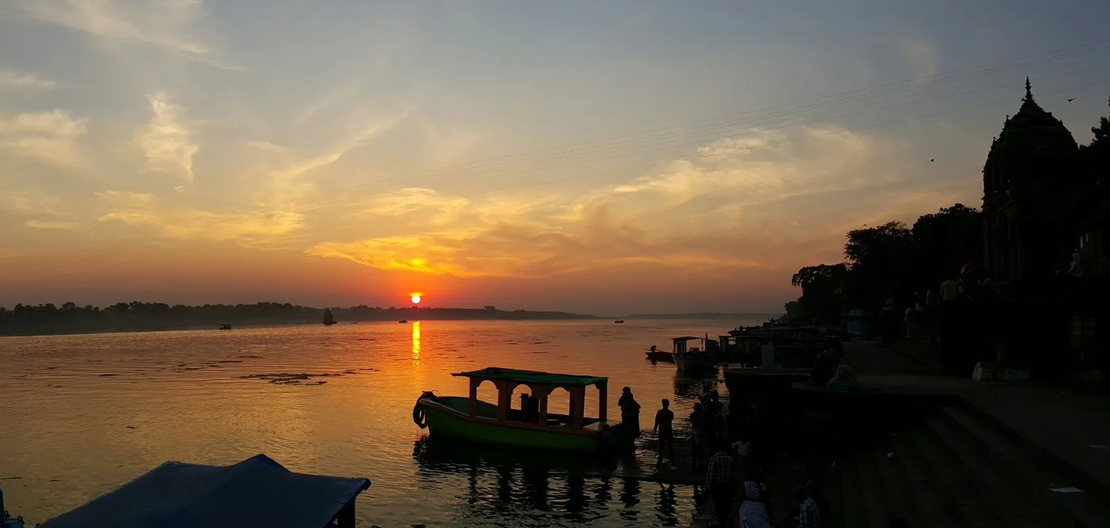 Boats at a ghat on the Narmada at Maheshwar, Khargone district, at sunset, file photo