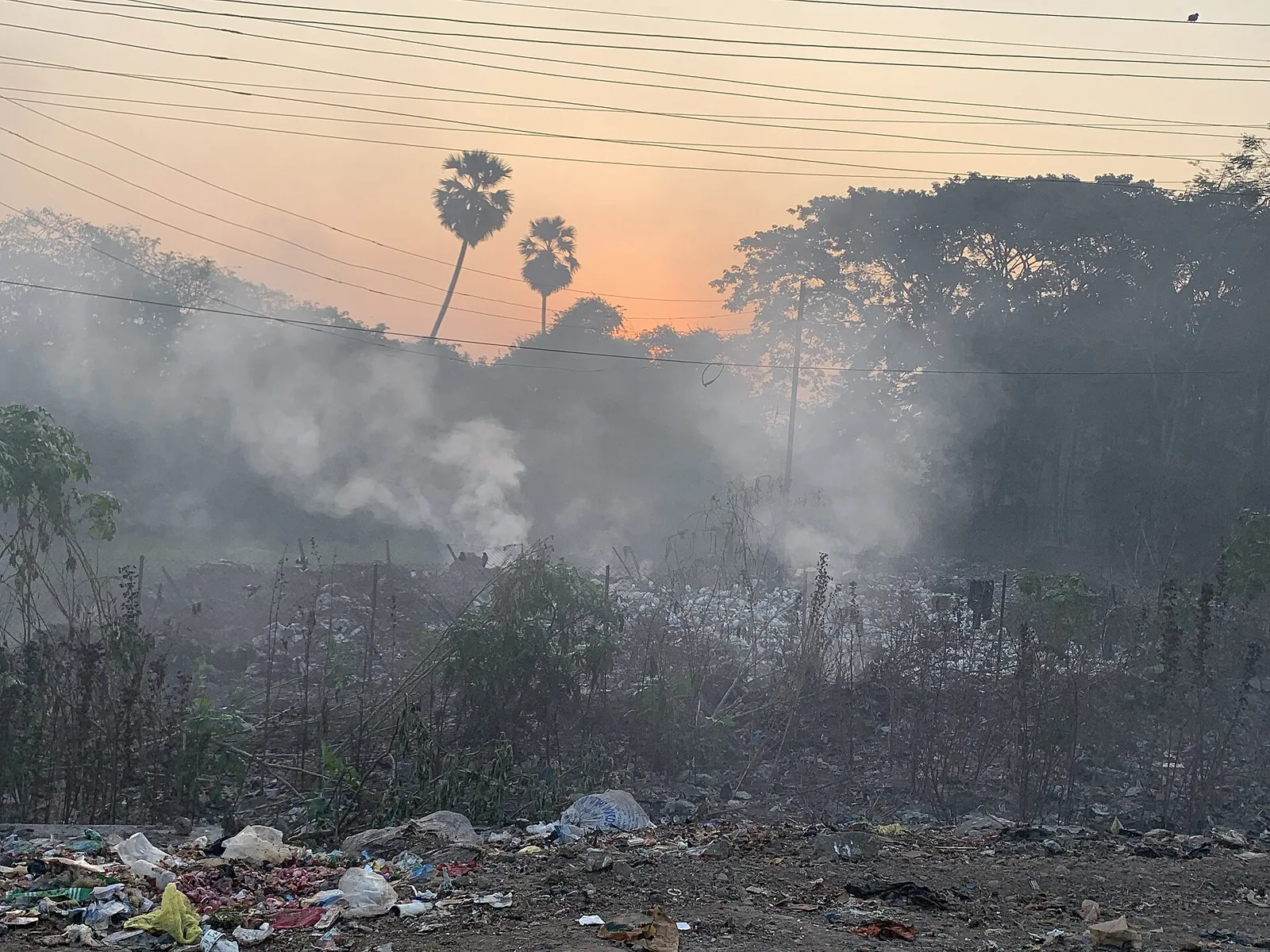 Burning roadside garbage dump at Panvel Naka near Mumbai