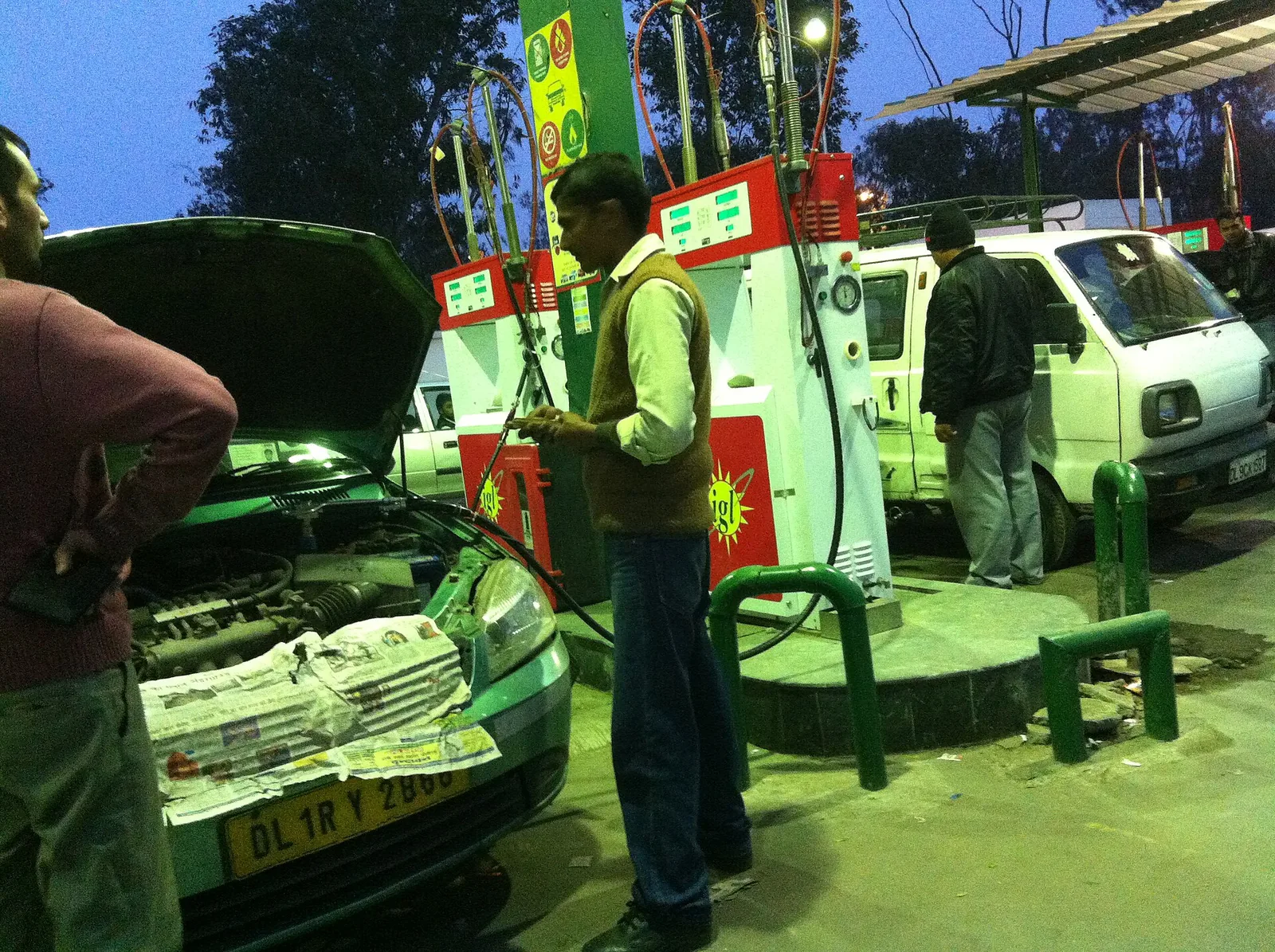 Cars at a CNG filling station in Delhi, one use of gas that natural gas imports supply