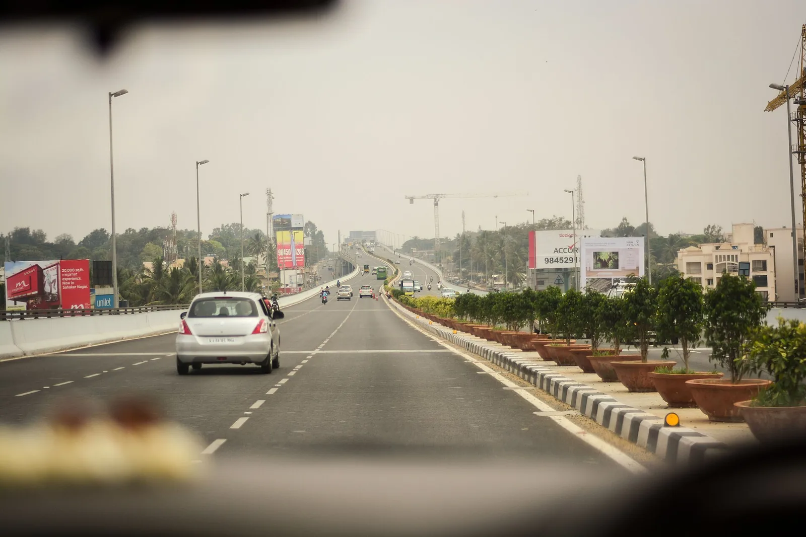 Cars on an elevated road in Bengaluru, where every vehicle is in the VAHAN register