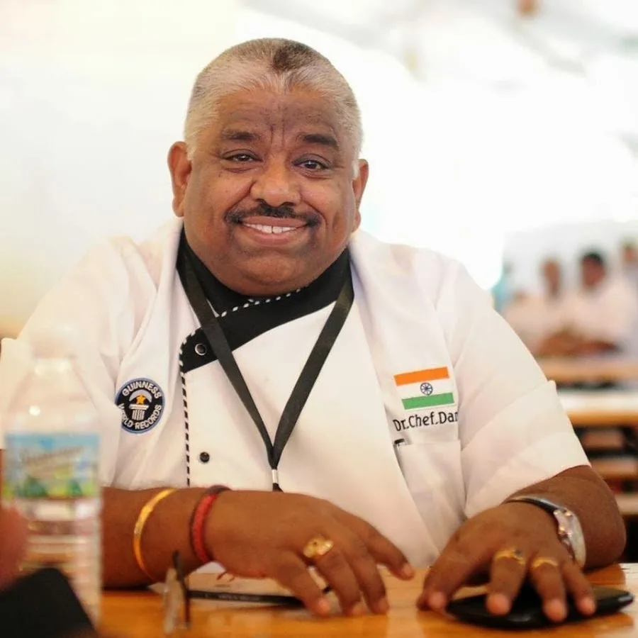 Chef Damu in his chef's whites with a Guinness World Records badge, file photo