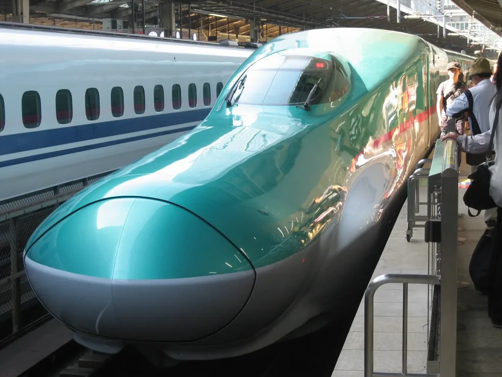 E5 series Shinkansen bullet train at a platform in Japan, bullet train corridor file photo