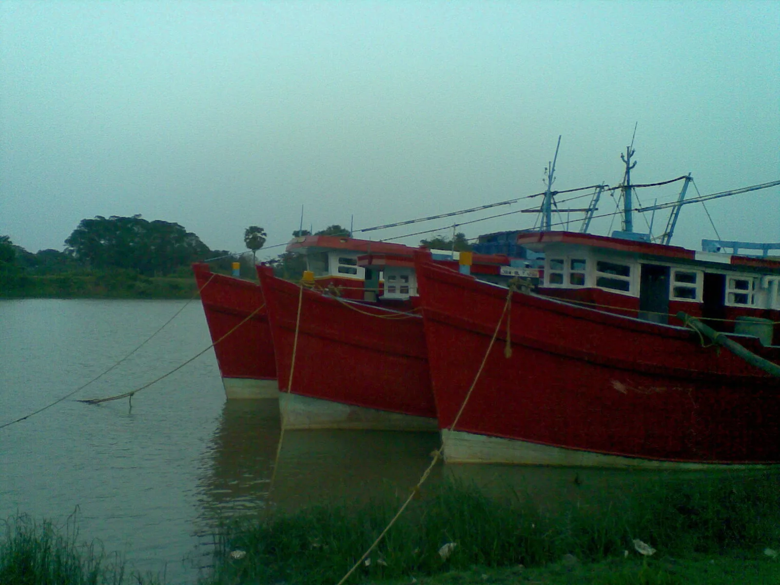 Fishing boats moored at Balighat in Balasore, Odisha, ahead of heavy rain