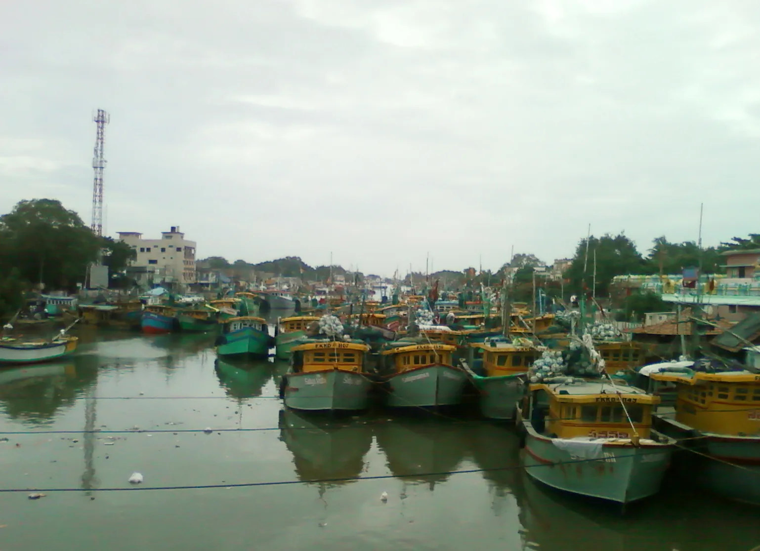 Fishing boats moored at Kakinada fishing harbour in Andhra Pradesh