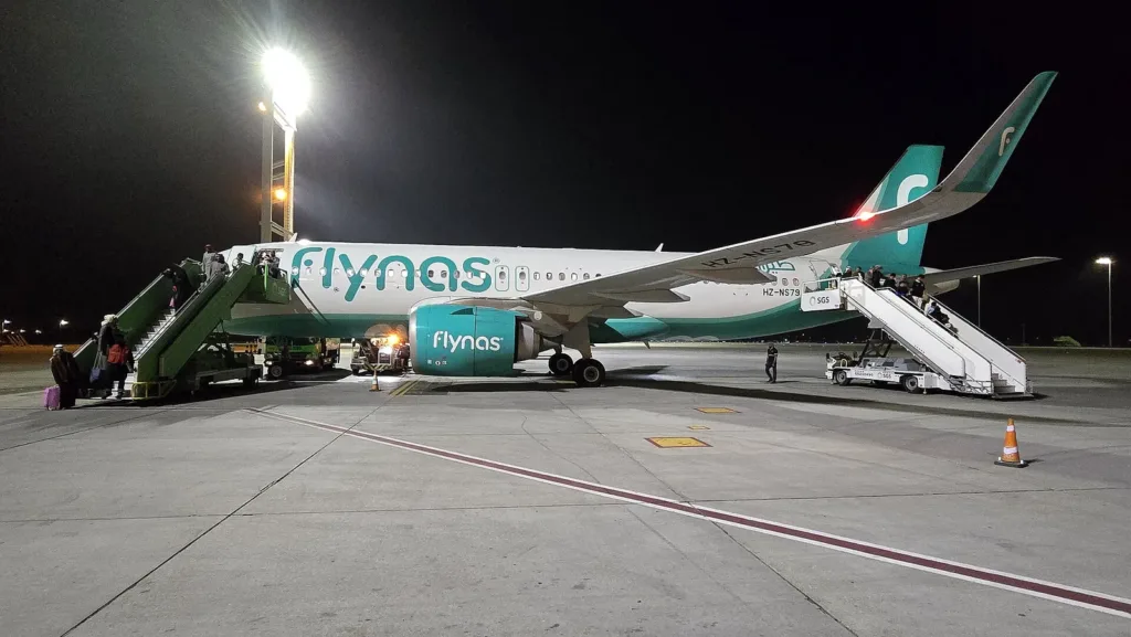 Flynas aircraft at night at King Fahd International Airport, site of the Dammam airport attack