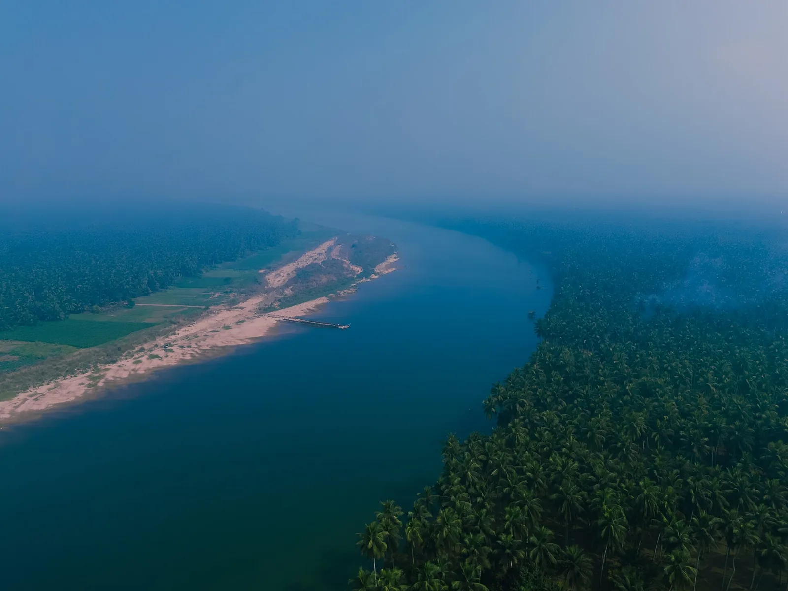 Godavari river and coconut groves in Konaseema, a district under red warnings