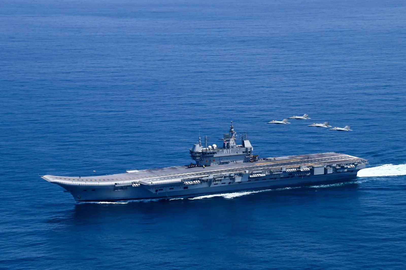 INS Vikrant in the Arabian Sea with four MiG-29K jets flying past, June 2023 file photo
