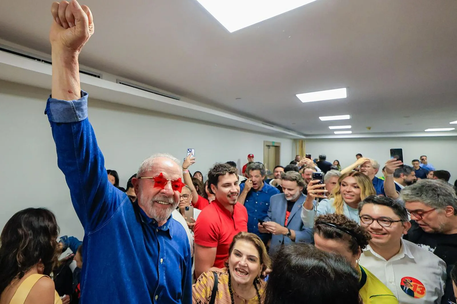 Lula raises a fist with supporters in São Paulo on election night, 25 October 2026, after his fourth term win