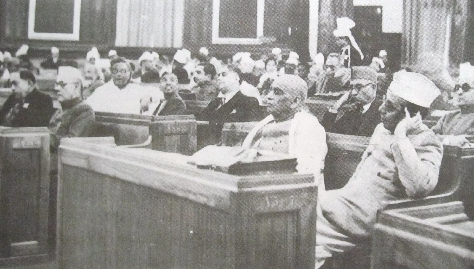 Members of the Constituent Assembly of India seated in the assembly hall, archival photo