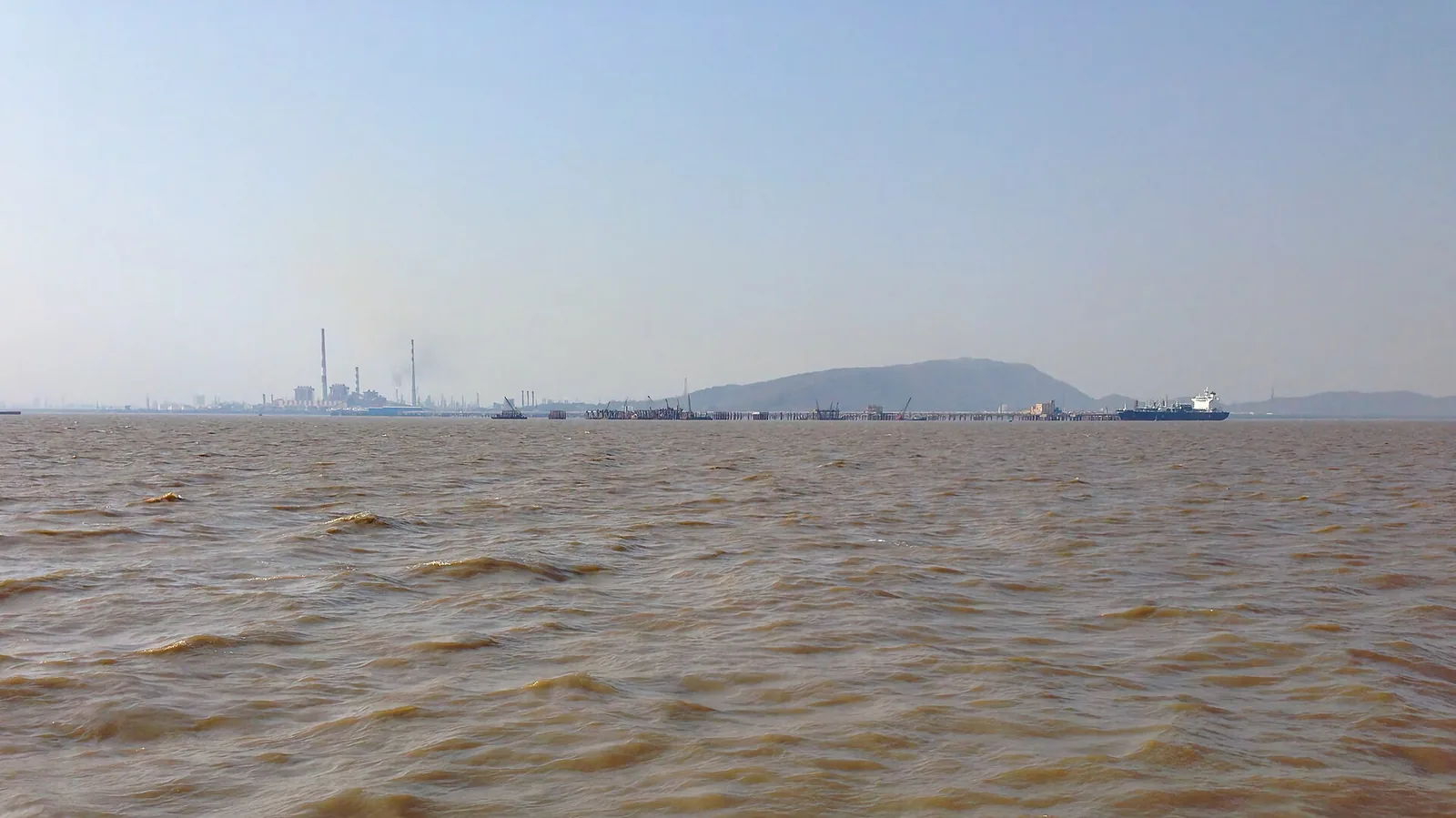 Mumbai refinery seen across Bombay Harbour with a tanker at the jetty, file photo