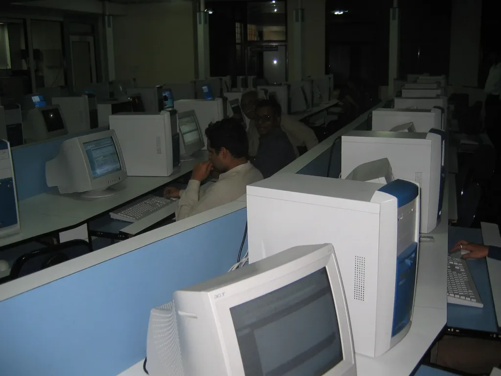 NCERT AI module: rows of desktop computers in a computer lab in Baramati, Maharashtra