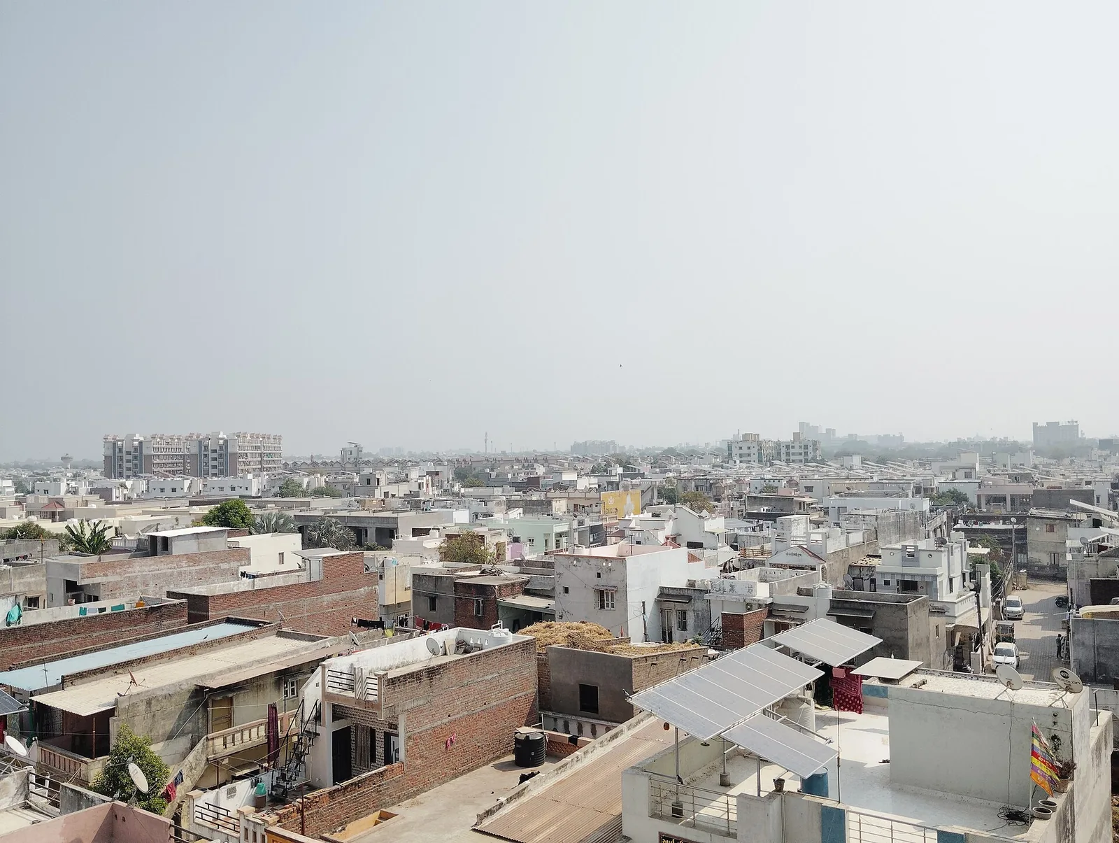 Rooftop solar panels on homes in Mehsana, Gujarat, file photo