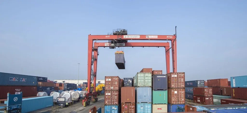 Shipping containers stacked at an Indian port as the India US trade deal nears