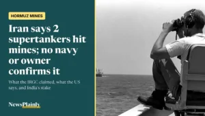 US Navy lookout watching an oil tanker in the Persian Gulf, as Iran makes new Hormuz mines claims