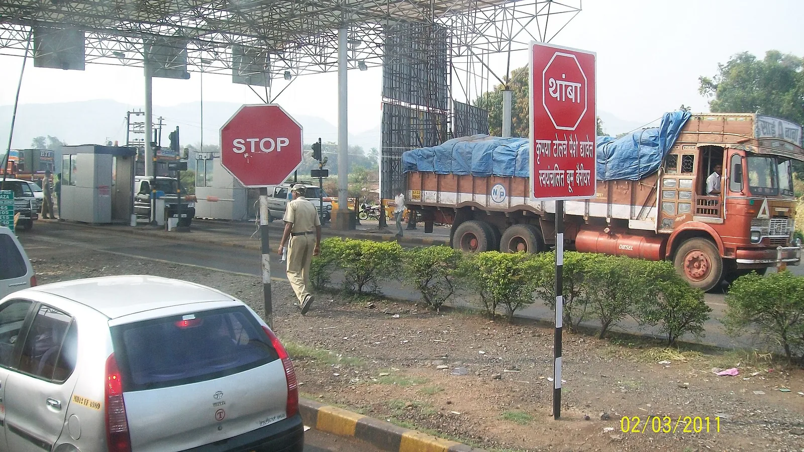 Vehicles at Anewadi toll plaza on the Pune-Satara highway, 2011 file photo