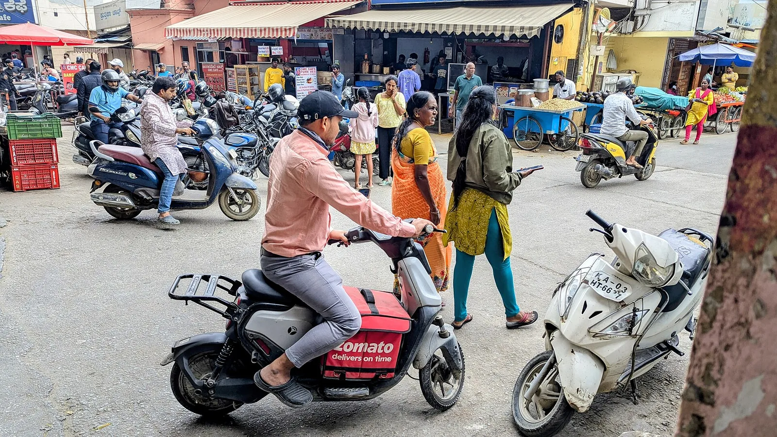 Zomato delivery partner on an electric bike in Bengaluru, January 2026, representative of gig workers